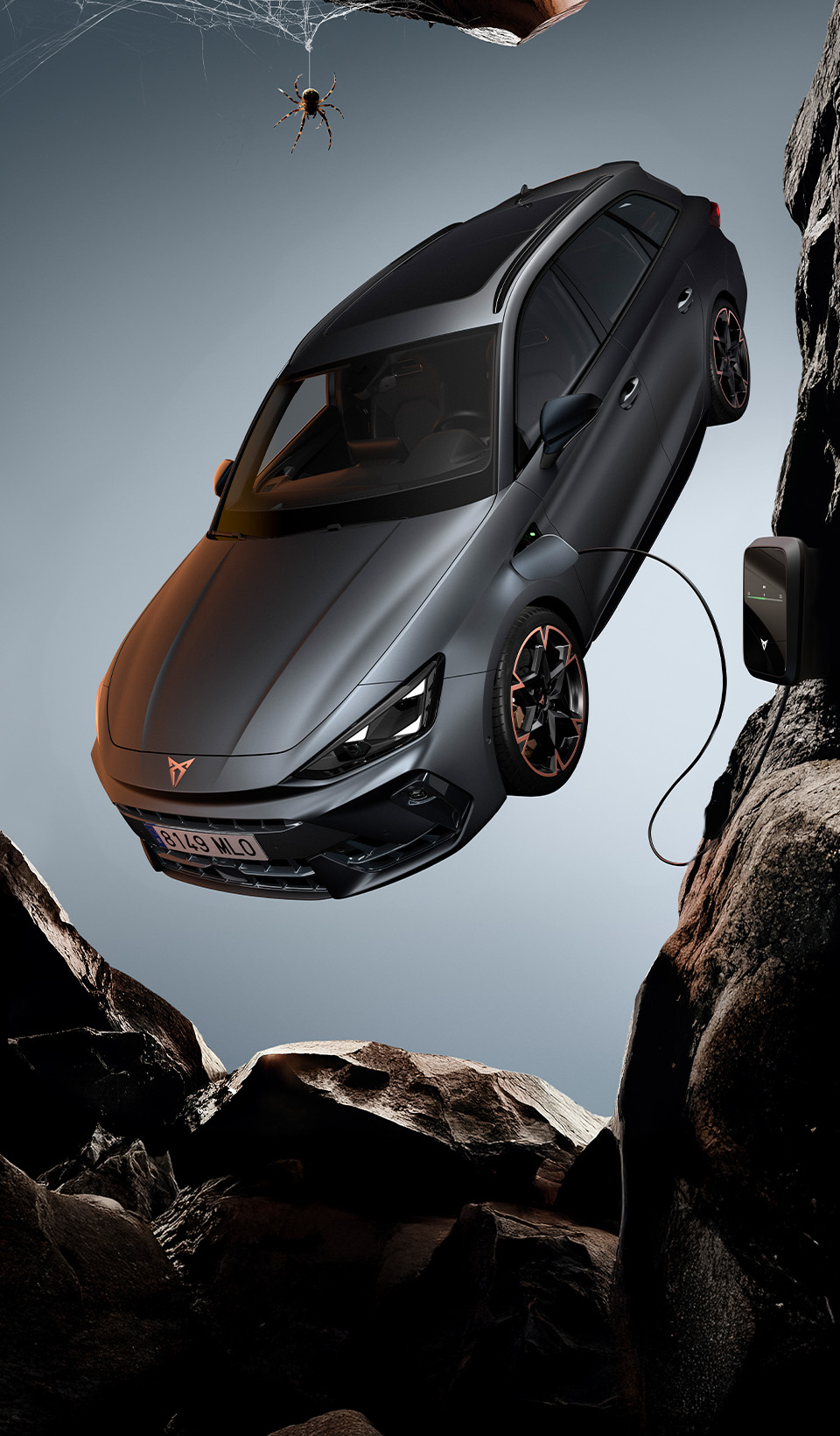 A CUPRA Leon Sportstourer shown from an elevated angle, with a person draped in dark, flowing fabric that creates a dynamic, red-lit trail beside the car.